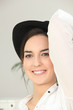 Smiling woman in a hat