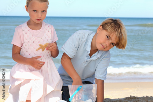 Photo: kids playing on the beach kids playing on the beach