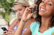 Photo: Young women embracing technology Young women embracing technology
