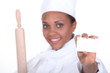 female chef holding business card