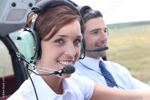 Photo: Female pilot of a light aircraft Female pilot of a light aircraft