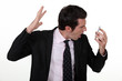 Businessman screaming