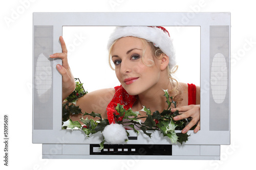 Photo: Woman dressing in festive costume Woman dressing in festive costume