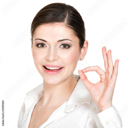 Photo: Young happy woman with ok sign Young happy woman with ok sign