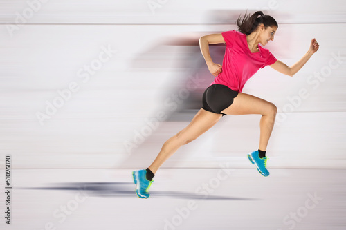 Photo: sport woman starting running. Speed effect. sport woman starting running. Speed effect.