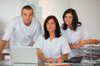 Photo: Three clinic workers Three clinic workers