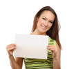 Foto: Beautiful woman holding empty white board Beautiful woman holding empty white board
