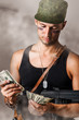 military man counting money