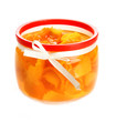 Orange jam with zest, isolated on white