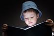 little boy read book