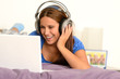 Young girl watching movie on laptop