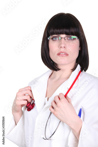 Photo: Serious female doctor Serious female doctor
