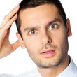 Shocked business man, on white