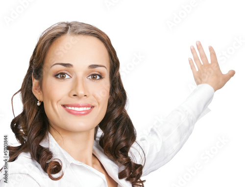 Photo: Businesswoman showing, isolated on white Businesswoman showing, isolated on white