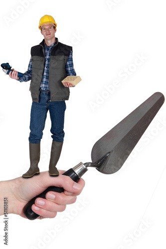 Photo: Bricklayer with a trowel Bricklayer with a trowel