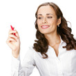 Businesswoman writing or drawing on screen, isolated