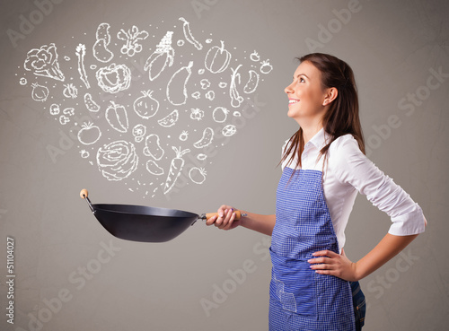 Photo: Woman cooking vegetables Woman cooking vegetables