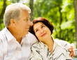 Senior happy couple embracing, outdoors