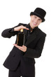 Retro stylish man demonstrates bottle with alcohol