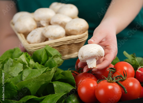 Photo: Woman selling champignon mushrooms Woman selling champignon mushrooms