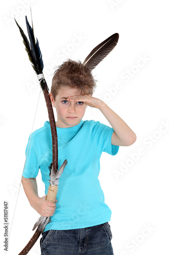 Photo: Child playing bow and arrows Child playing bow and arrows