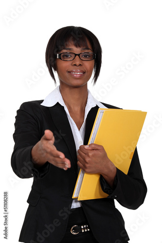 Photo: Afro-American woman greeting somebody Afro-American woman greeting somebody