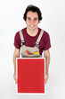Photo: Carpenter with a blank board Carpenter with a blank board