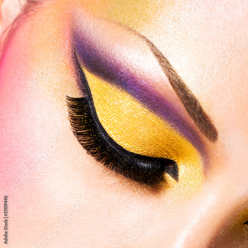 Photo: Beautiful face of a woman with fashion makeup Beautiful face of a woman with fashion makeup