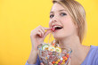 Woman eating candy
