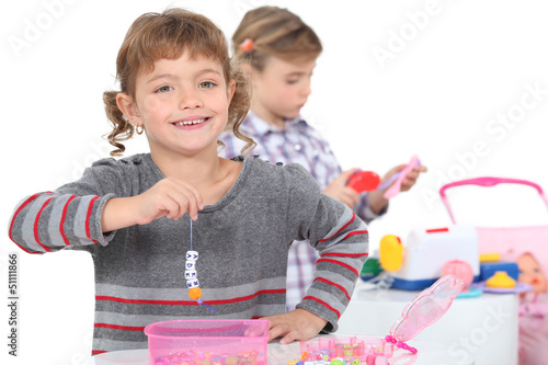 Photo: two little girls playing two little girls playing