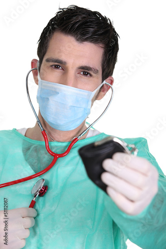 Photo: Doctor holding purse Doctor holding purse