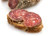 Foto: Slices of sausage on bread. Slices of sausage on bread.