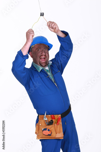Photo: Electrician getting a shock Electrician getting a shock