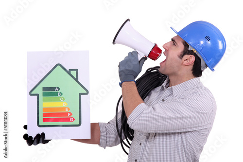 Photo: Construction worker promoting energy savings. Construction worker promoting energy savings.