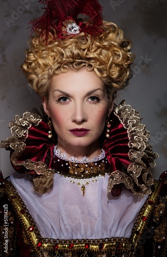 Photo: Picture of beautiful haughty queen in royal dress Picture of beautiful haughty queen in royal dress