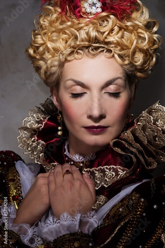 Photo: Picture of beautiful haughty queen in royal dress Picture of beautiful haughty queen in royal dress