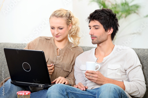 Photo: Couple on laptop Couple on laptop