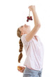 young beautiful woman choosing between burger and grapes