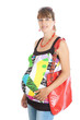 A pregnant woman (9 months) with a red bag