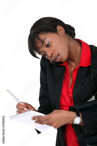 Photo: Afro-American secretary on the phone Afro-American secretary on the phone