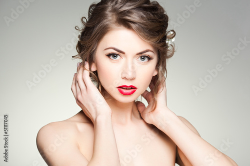 Photo: beautiful woman with perfect skin wearing natural make-up beautiful woman with perfect skin wearing natural make-up