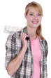 Blond woman about to start painting