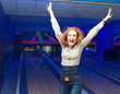 Photo: Excited girl in a bowling Excited girl in a bowling