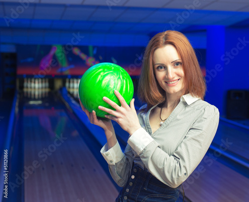 Photo: Beautiful woman in a bowling Beautiful woman in a bowling