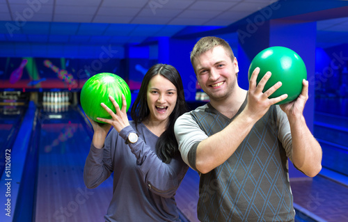 Photo: Happy couple in a bowling Happy couple in a bowling