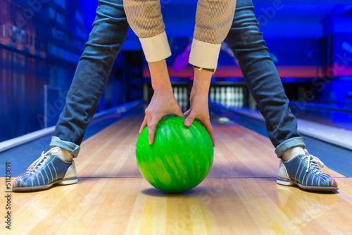 Photo: Beginner aiming to bowling pins Beginner aiming to bowling pins