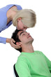 Woman kissing boyfriend on forehead