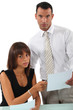 Business couple going over paperwork