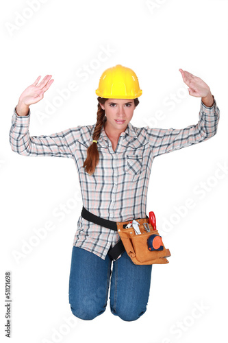 Photo: Tradeswoman holding up her hands Tradeswoman holding up her hands