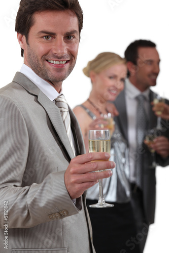 Photo: People drinking champagne People drinking champagne